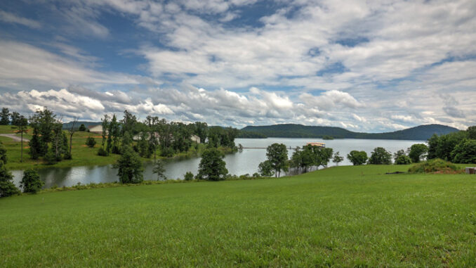 View of cherokee lake from grassy shoreline